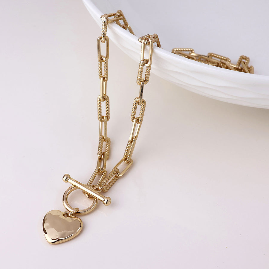 Foundry golden heart and t-bar necklace