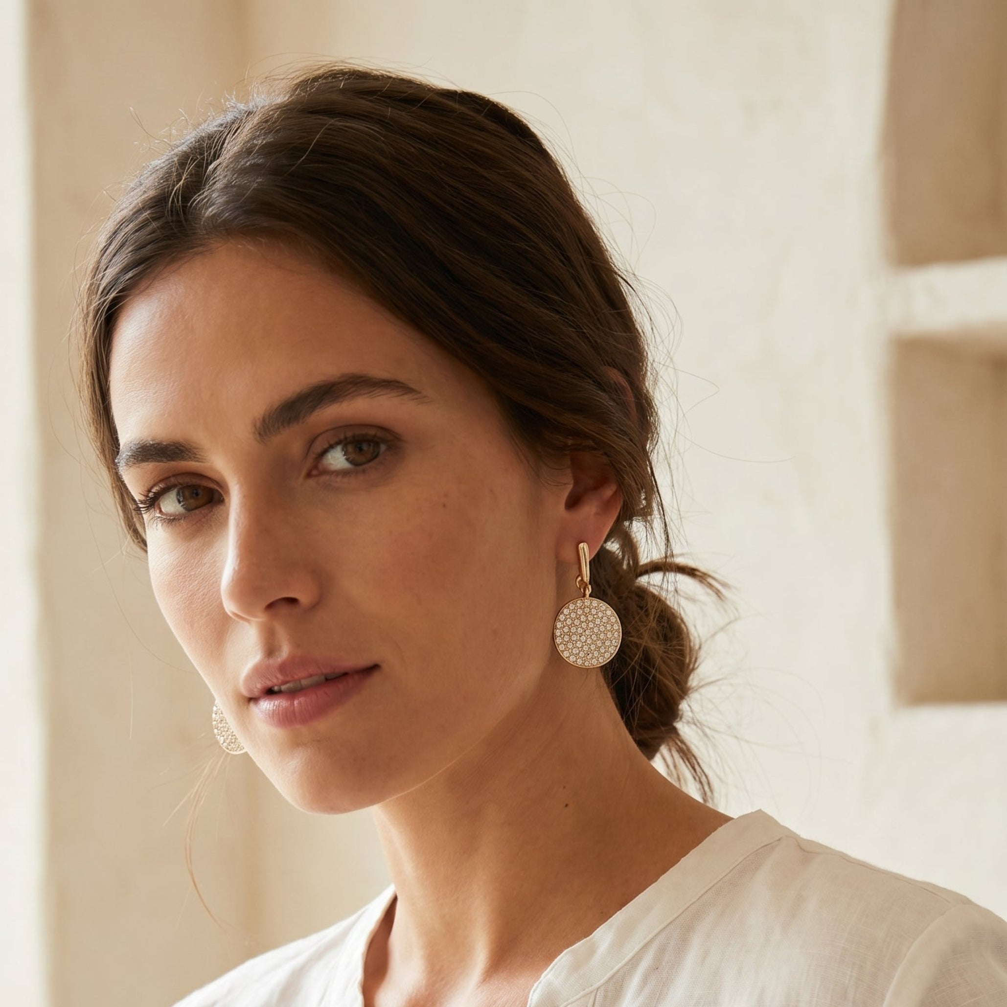 Gold disc drop earrings
