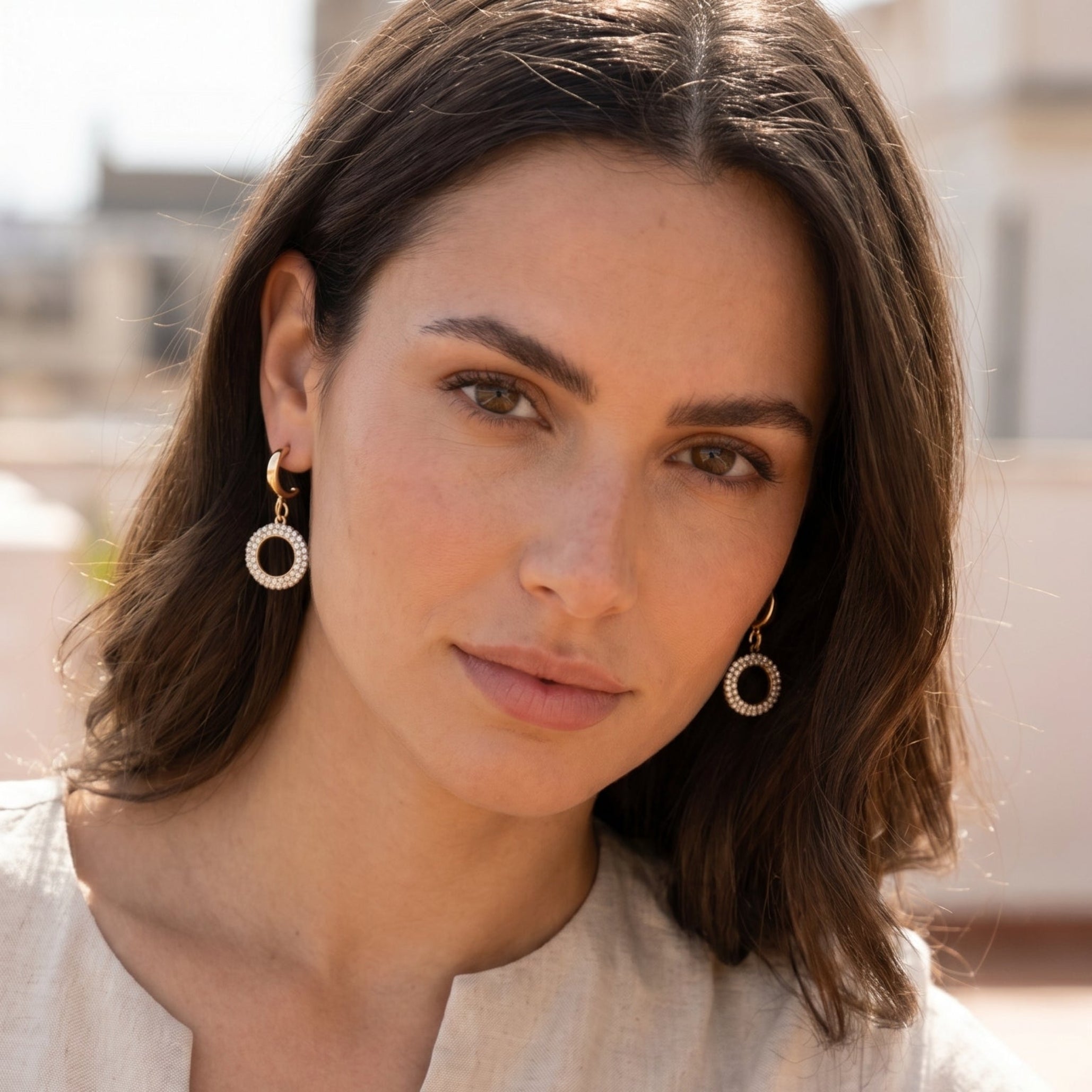 Gold open circle drop earrings