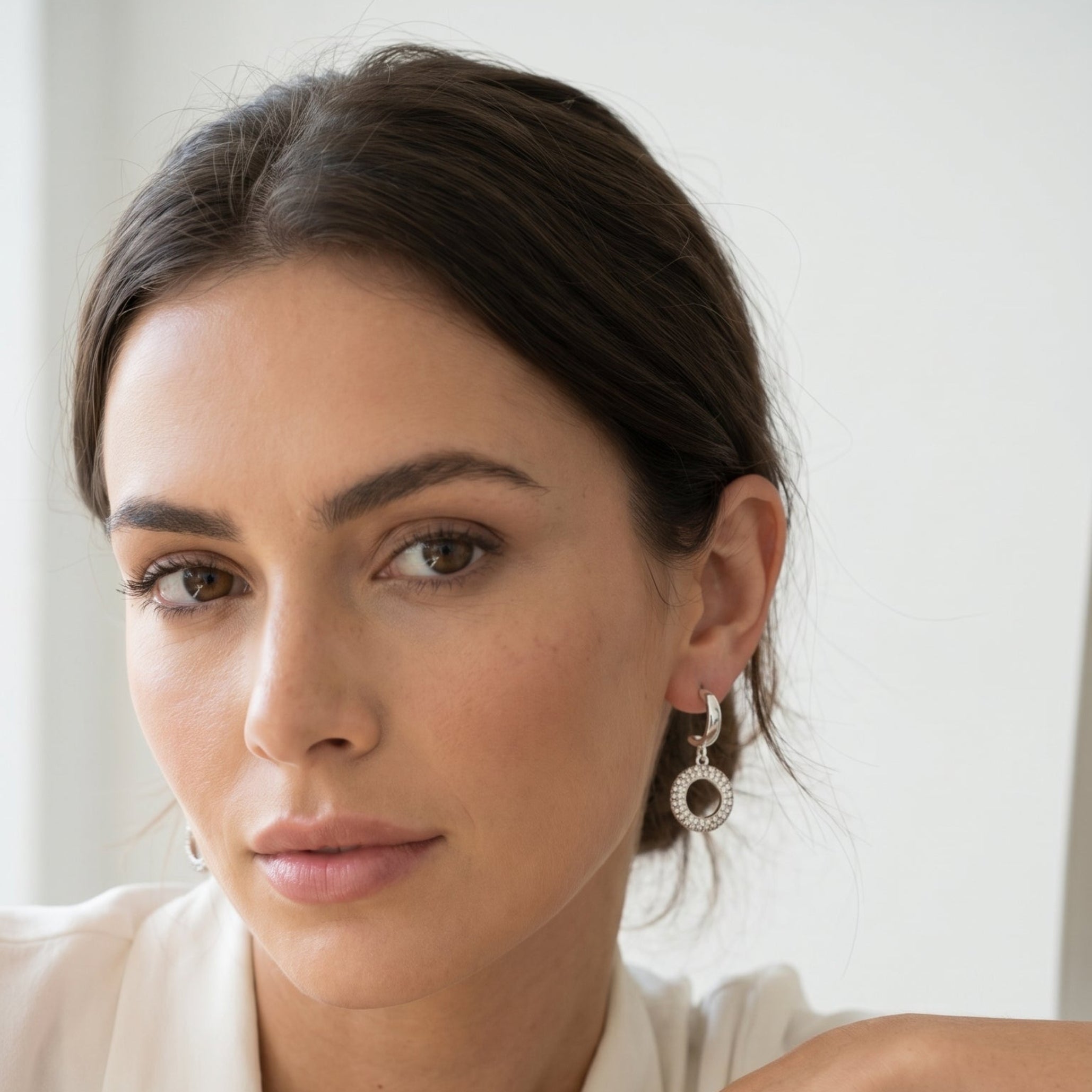 Silver open circle drop earrings