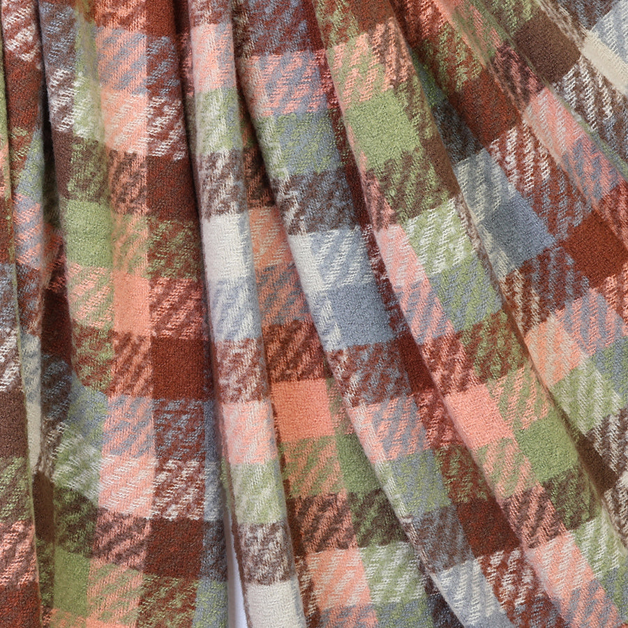 Close-up of the POM Jessica salmon, sage and brown mix check scarf fabric, showing the rich autumnal check pattern in salmon, sage green, rust, brown, grey-blue and cream tones with a soft textured woven finish.