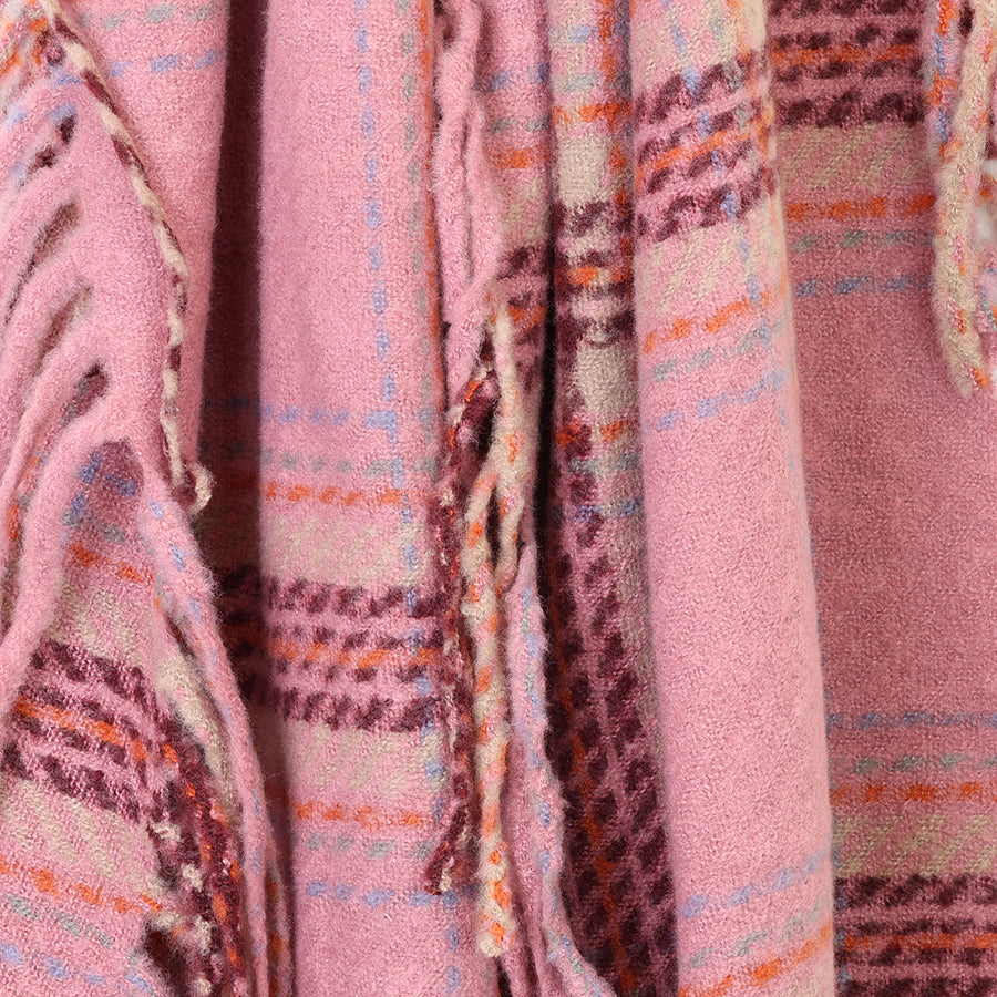 Close-up of the POM Darcie rose pink mix fringe edge check scarf fabric, showing the burgundy, orange and lilac check stripes on the soft rose pink base with long fringe edge detail.