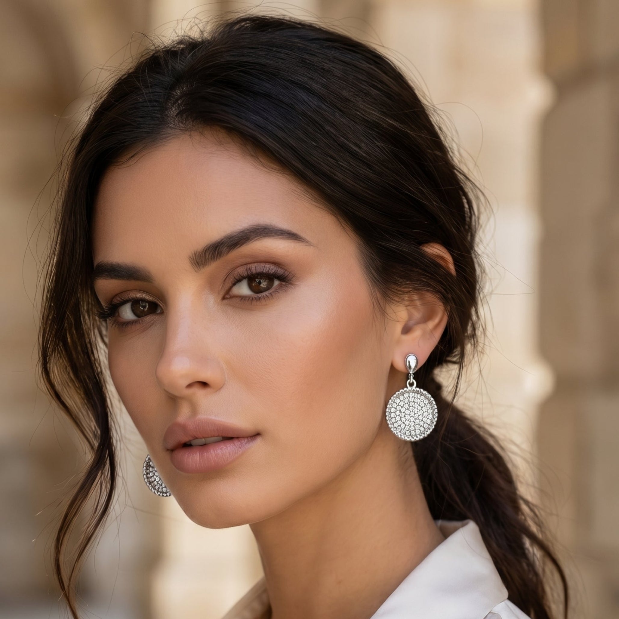 Silver disc drop earrings