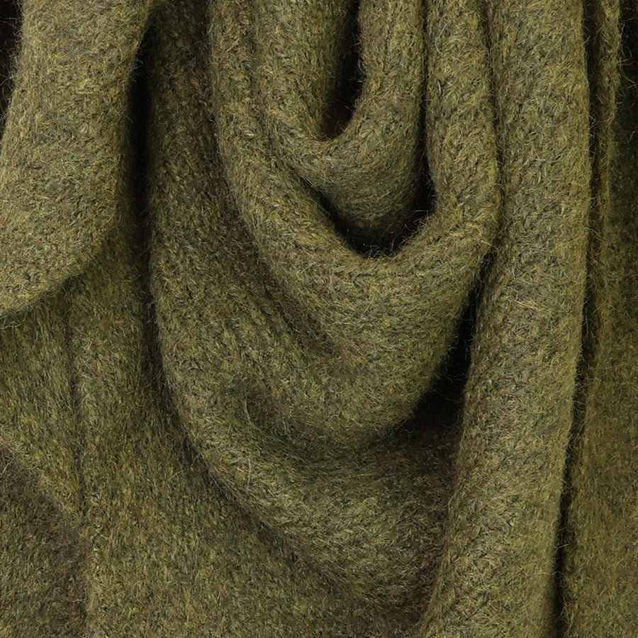 Close-up of the POM Ashleigh khaki chunky knit scarf fabric, showing the ultra-soft fluffy knit texture in rich earthy khaki marl tones.
