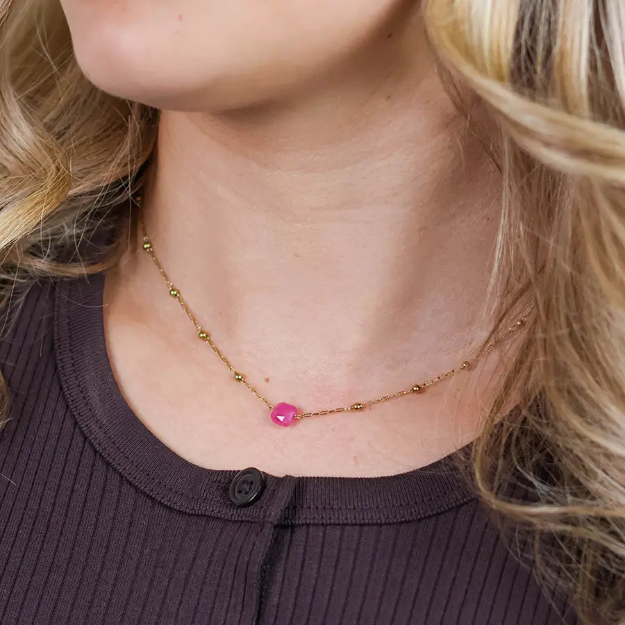 Dotty stainless steel gold plated bead station and pink stone bracelet
