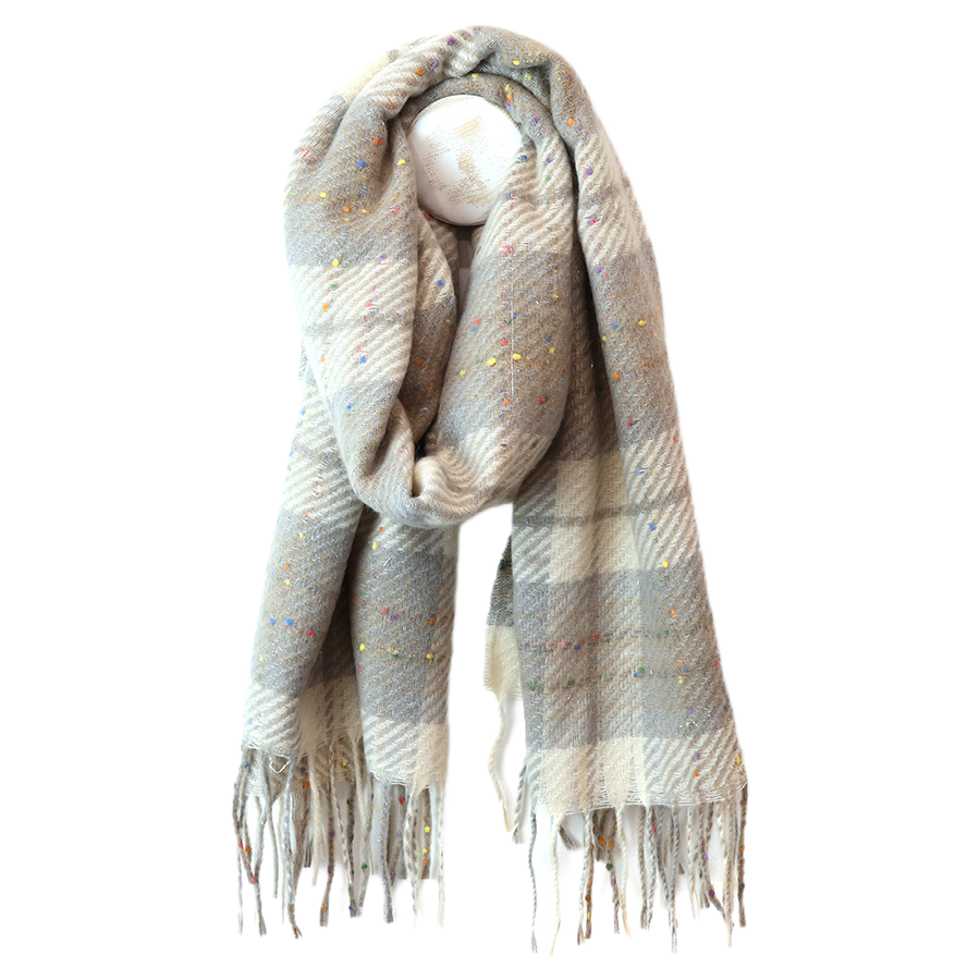 POM Olivia taupe mix tartan weave scarf looped on a mannequin stand against a white background, showing the oversized taupe and cream tartan weave with scattered multicolour confetti fleck detail and twisted fringe ends.
