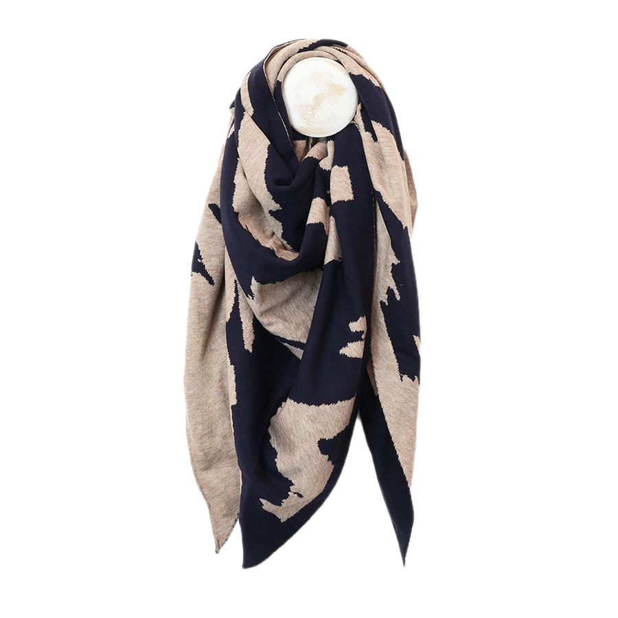 POM navy and oatmeal abstract animal print oversized triangle scarf draped on a mannequin, showing the bold two-tone knit pattern and generous size against a white background.