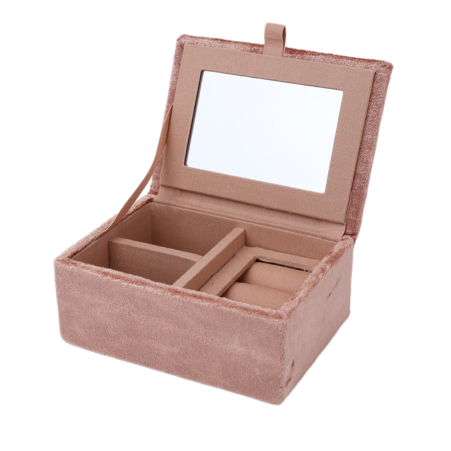 POM Crane blush velvet jewellery box shown open, revealing a mirror inside the lid, blush velvet ring roll and compartments for storing jewellery, against a white background.