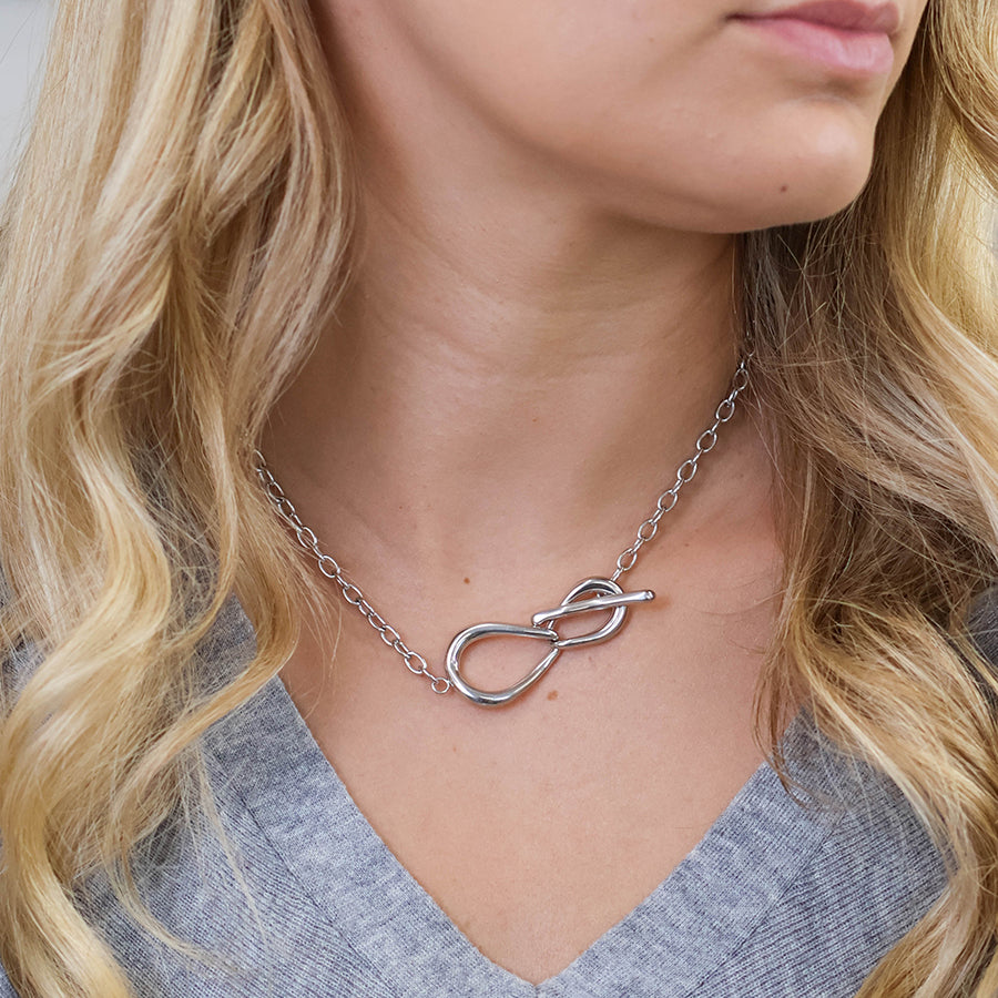 Moebius stainless steel platinum plated infinity t-bar necklace