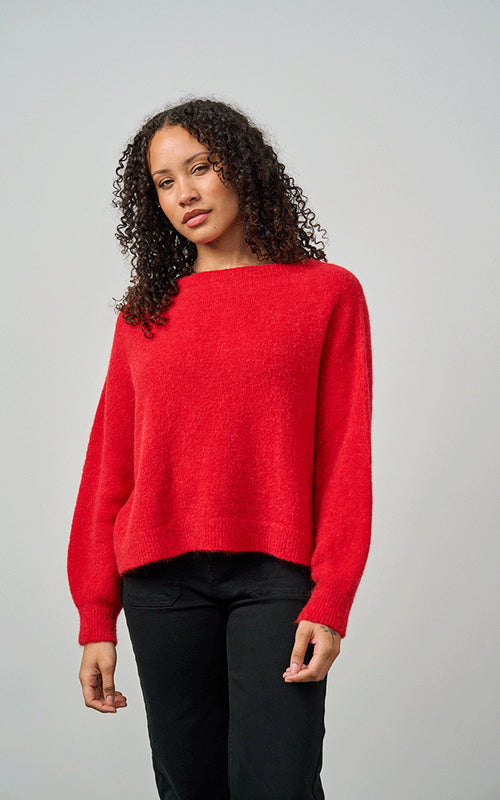 Woman wearing Luella Bettina red alpaca wool blend crew neck jumper with long sleeves