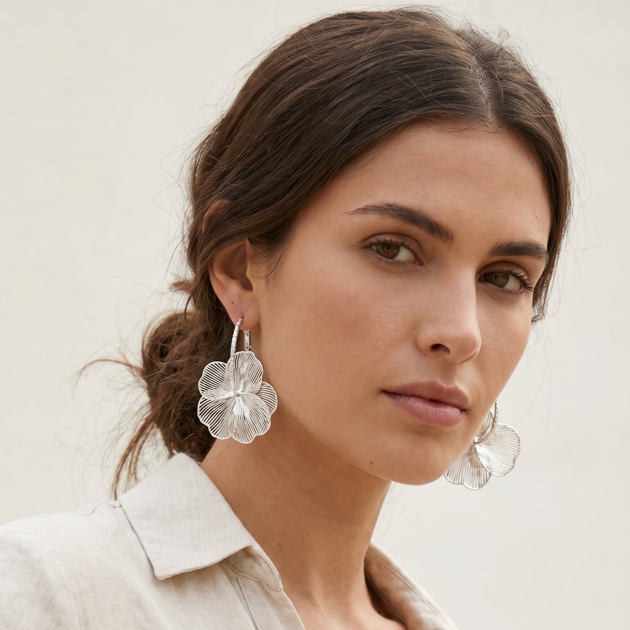 Silver flower drop earrings