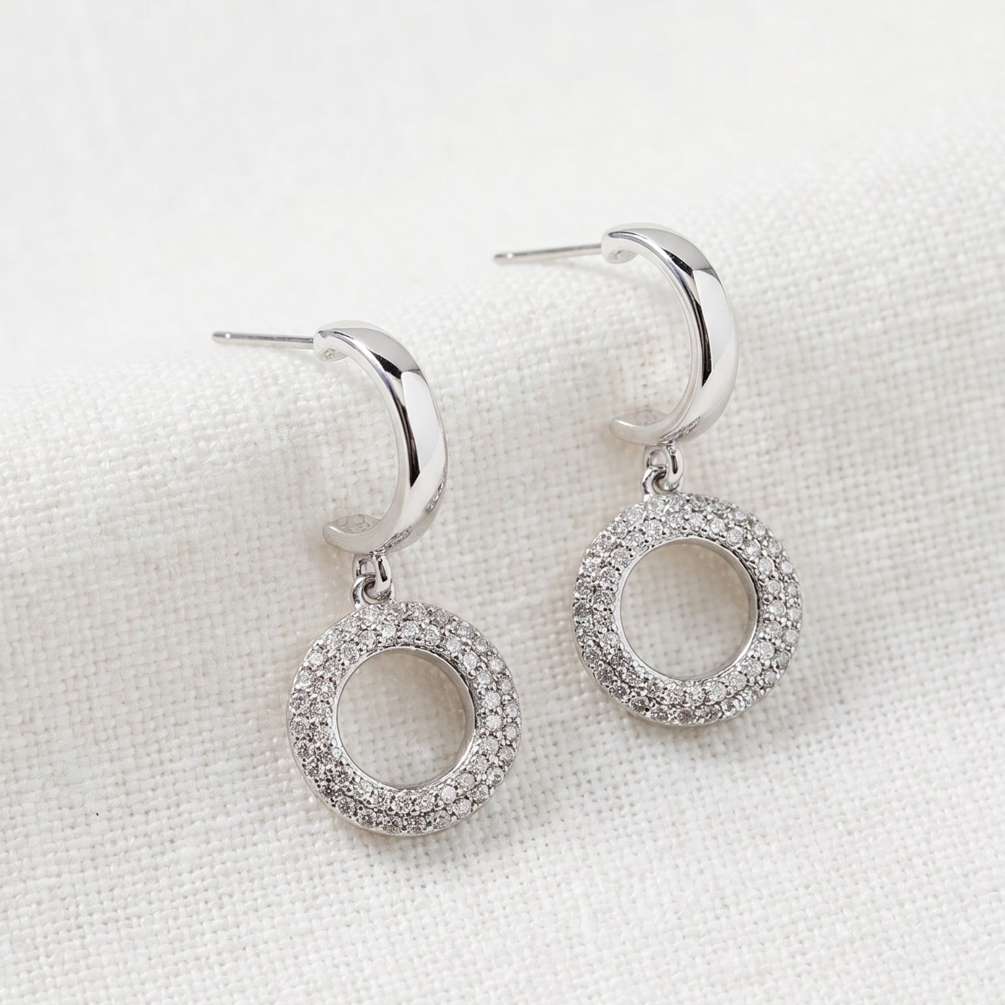 Silver open circle drop earrings