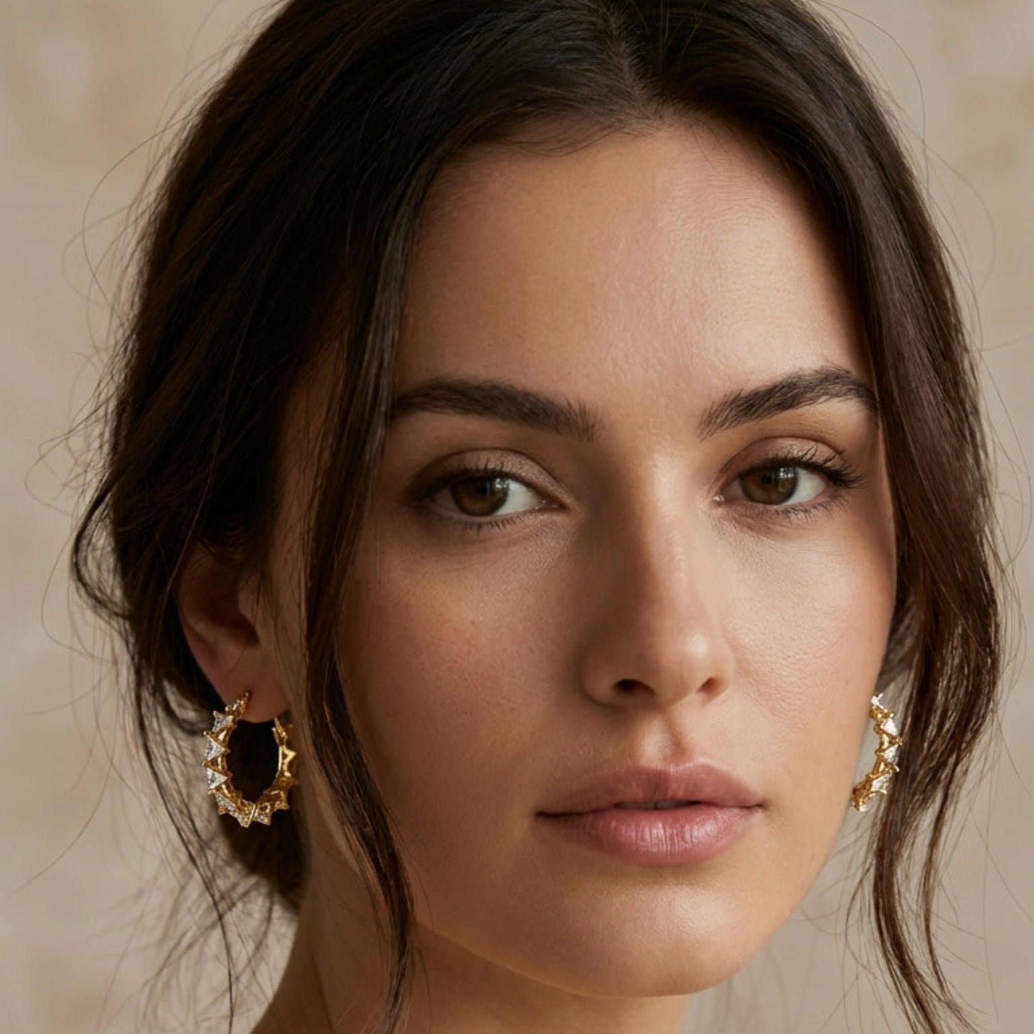 Gold textured spike hoop earrings