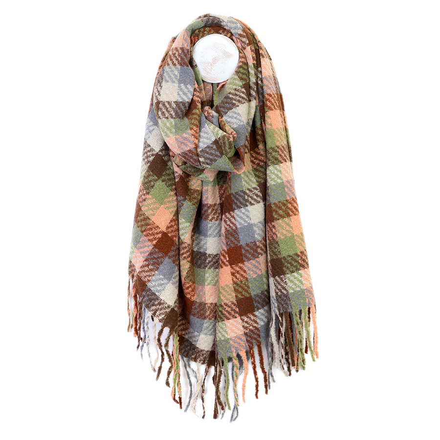 POM Jessica salmon, sage and brown mix check scarf draped on a mannequin stand against a white background, showing the autumnal check pattern in salmon, sage green, brown, rust, grey-blue and cream with mixed m