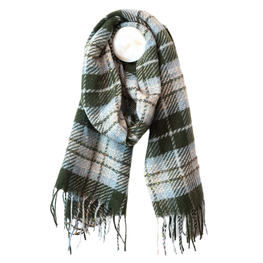POM Olivia dark khaki mix tartan weave scarf draped on a mannequin stand against a white background, showing the classic dark khaki and pale blue-grey tartan weave with scattered multicolour fleck detail and long knotted fringe ends.