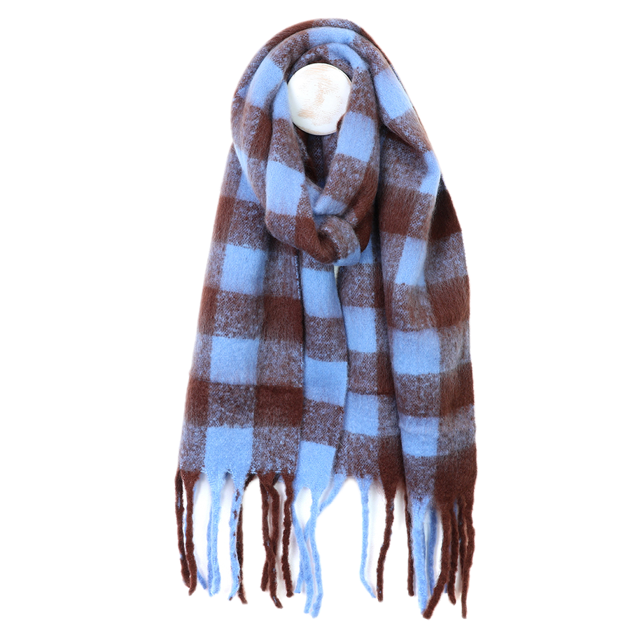 POM Molly brown and cornflower blue large check scarf with tassel ends, looped around a mannequin against a white background.