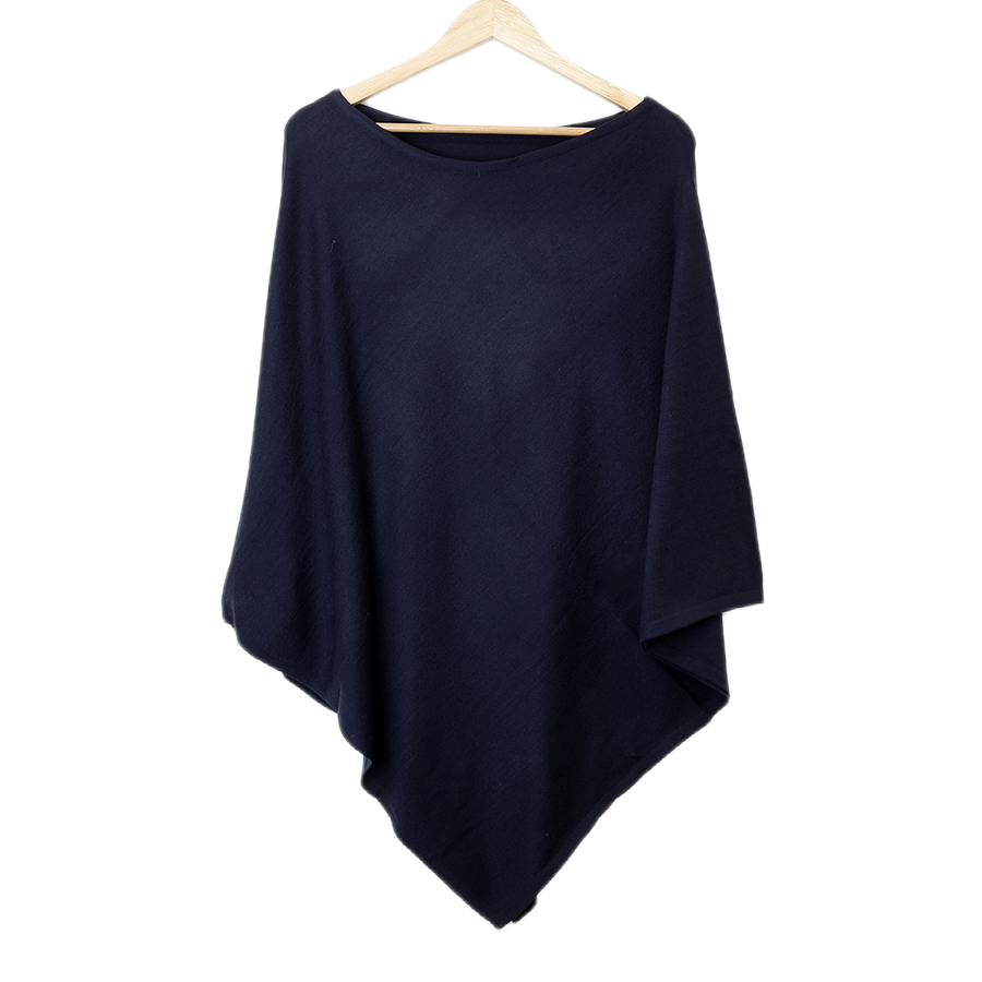POM recycled blend navy poncho hanging on a wooden hanger against a white background, showing the asymmetric hem and relaxed drape.