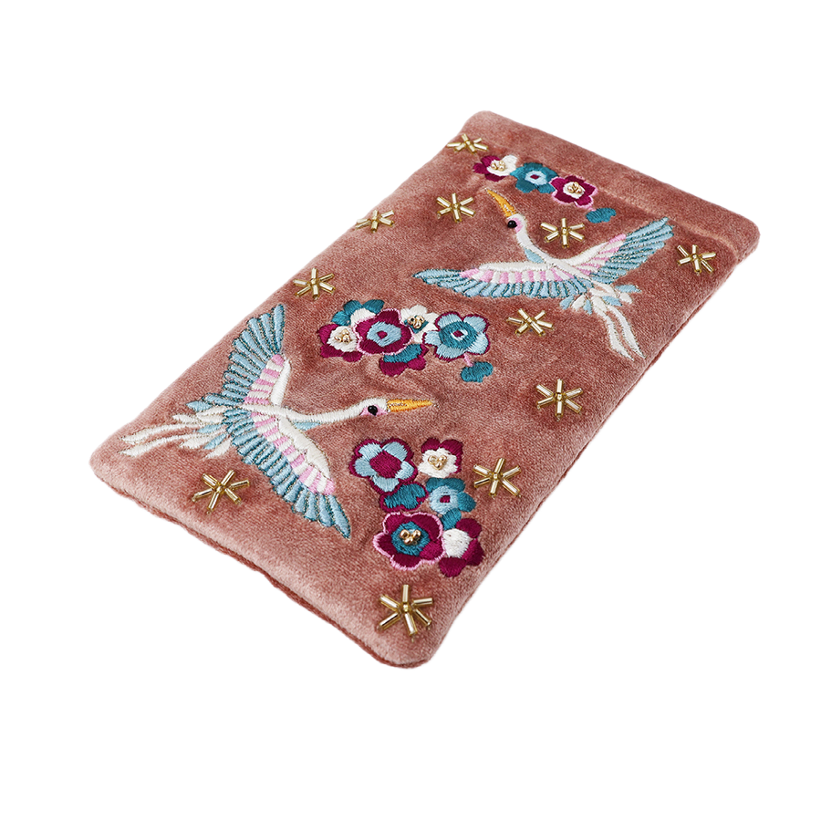 POM Crane blush velvet glasses case laid flat, hand-embroidered with two soaring cranes, teal and burgundy blooms and scattered gold star beads on soft blush velvet.