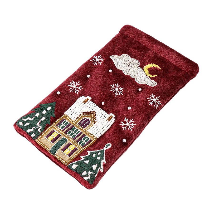 POM Winter Street wine velvet glasses case laid flat, hand-embroidered with a glowing winter house, snow-dusted Christmas trees, pearl snowflakes and a golden crescent moon on deep wine velvet.