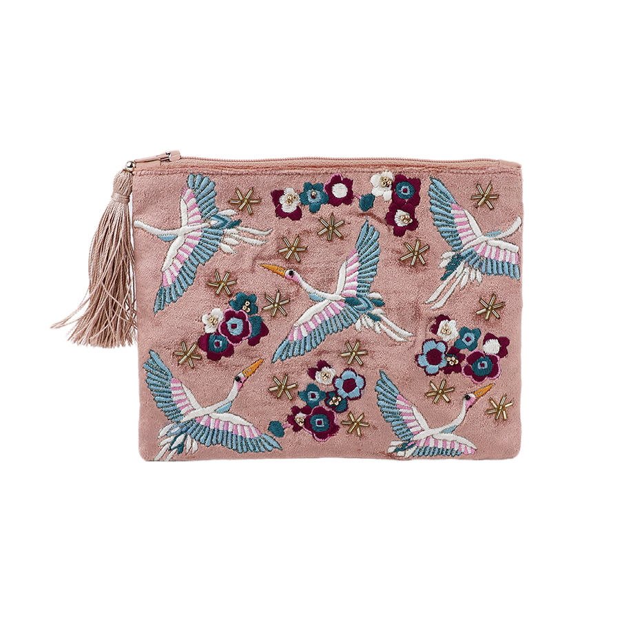 POM Crane blush velvet zip purse shown flat from the front, hand-embroidered all over with soaring cranes in white, teal and pink, teal and burgundy blooms and gold star beads, with a blush silk tassel zip pull.