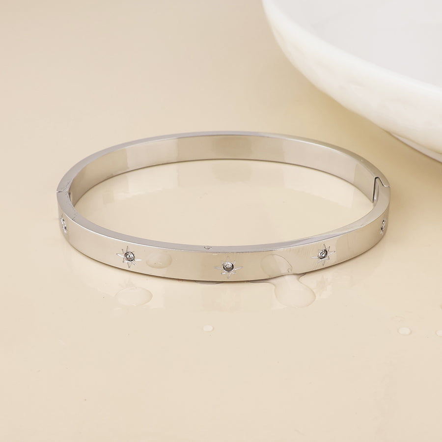 North stainless steel platinum plated crystal star studded bangle